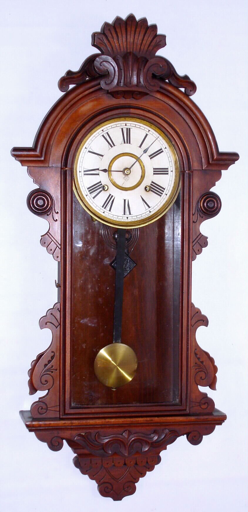 Ansonia Clock Co., New York, "Queen Mab" wall clock 8 day time and strike movement in walnut case, c1904 — Antique Clocks Price Guide