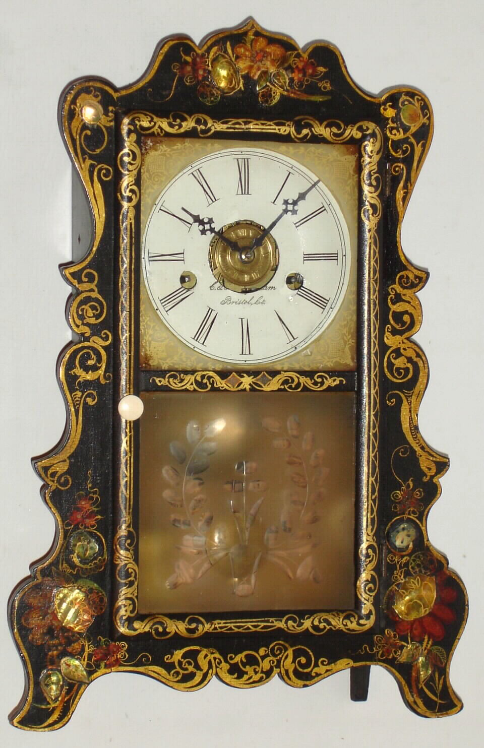 E. and A. Ingraham, Bristol, Ct., scroll front stenciled 30 hour time and strike shelf clock, c1855. — Antique Clocks Price Guide