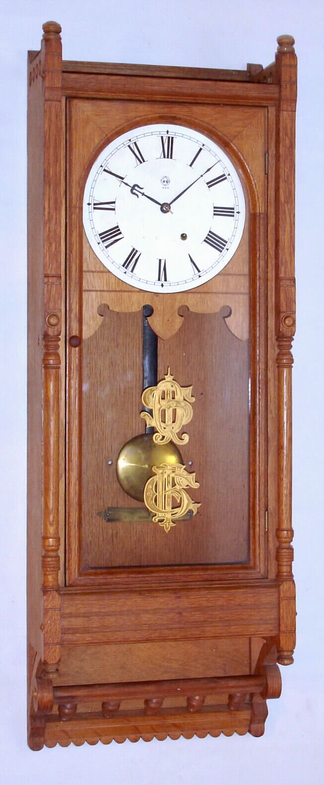 Seth Thomas Clock Co., Thomaston, Conn., "Queen Anne" 8 day time only spring driven oak wall clock, c1880 — Antique Clocks Price Guide