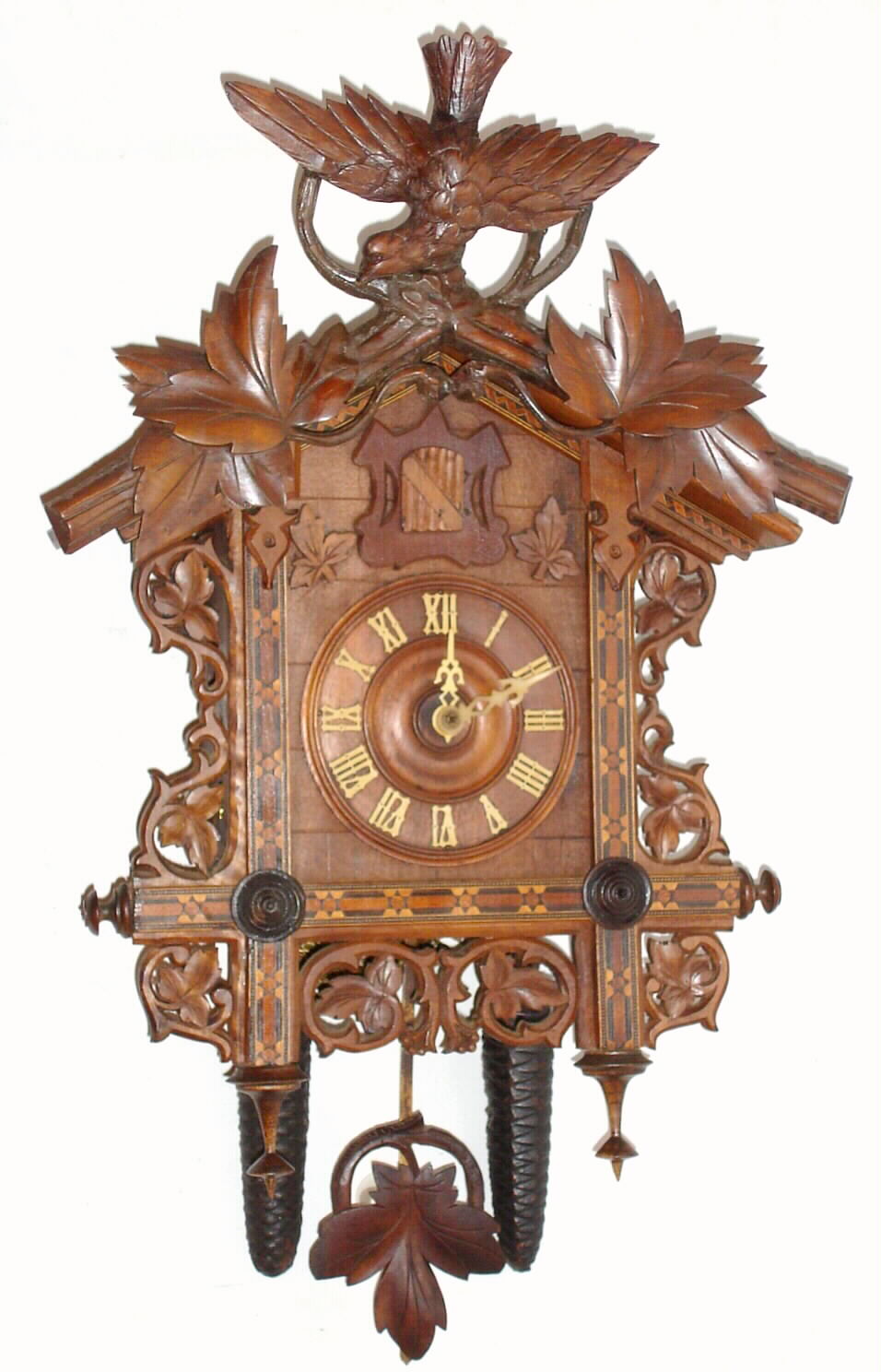 German Black Forest 30-hour time and strike spring driven inlaid cuckoo clock, c1910 — Antique Clocks Price Guide