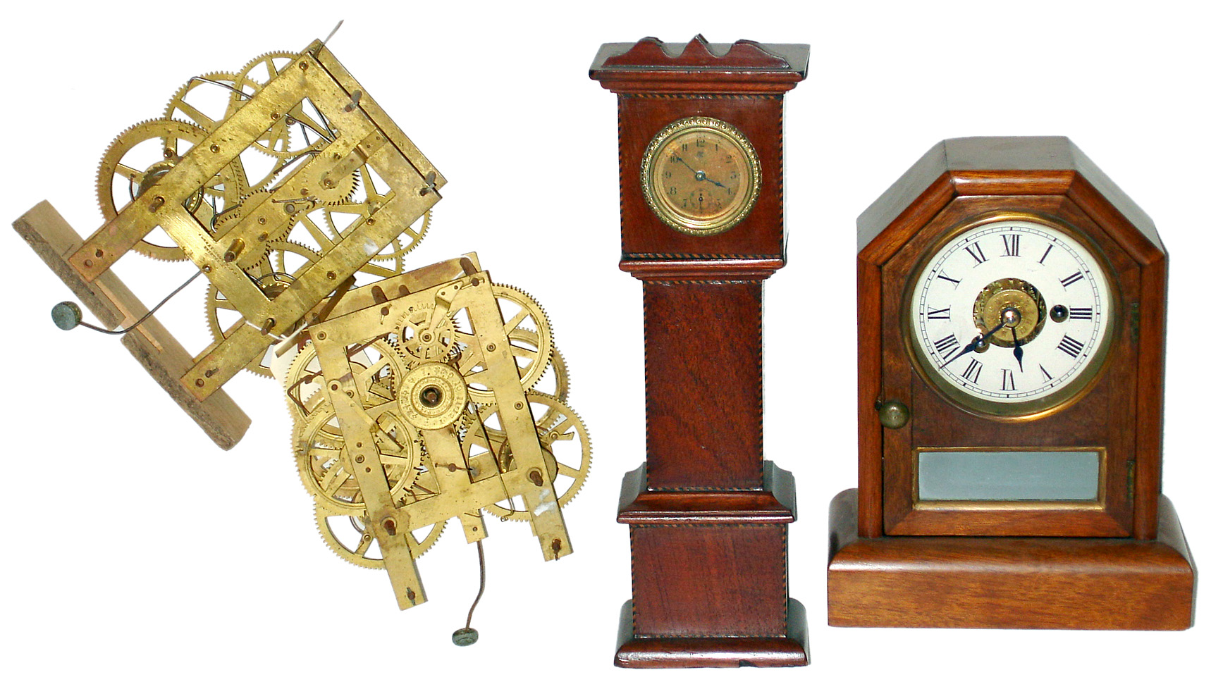 Five piece clock lot: Seth Thomas time/alarm; Waterbury long case German cuckoo, and 2 weight-driven 8-day striking movements, late 19th century. — Antique Clocks Price Guide