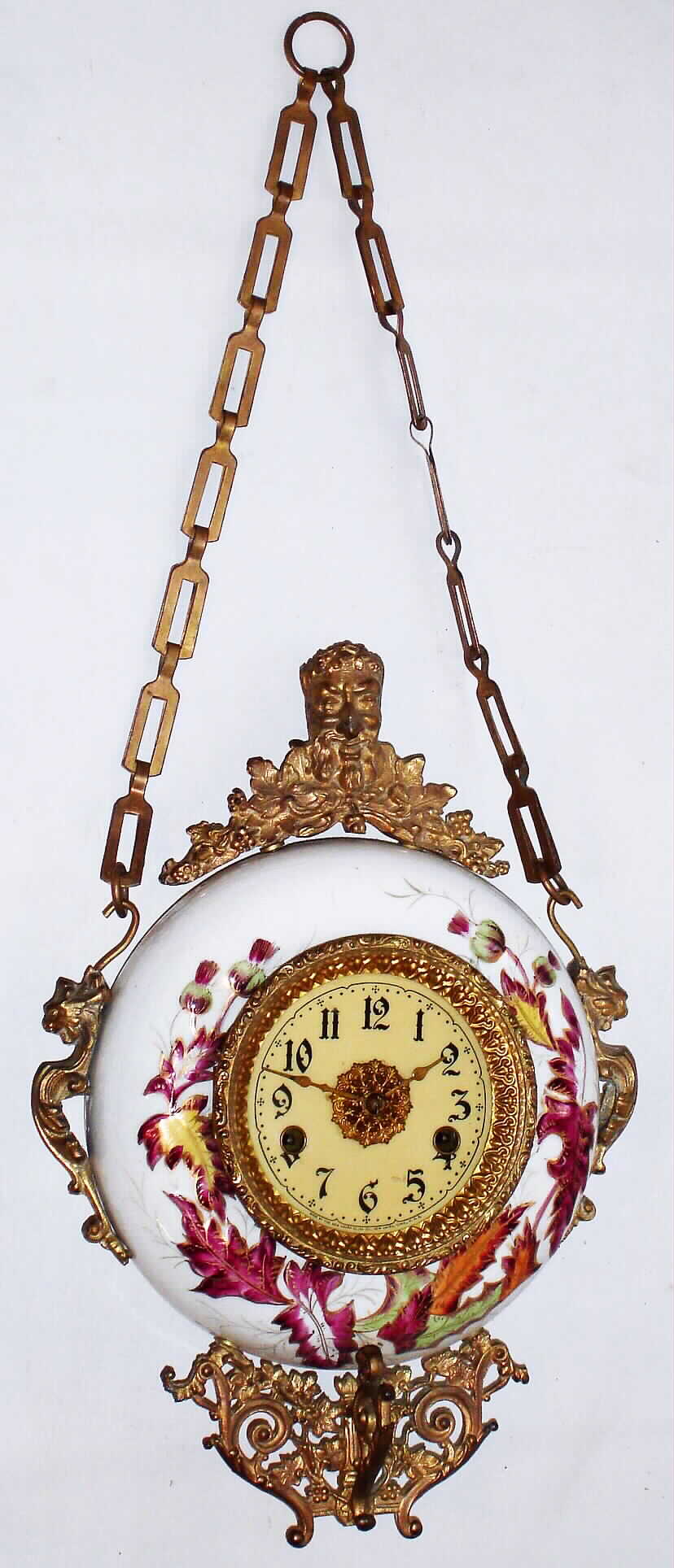 New Haven Clock Co, New Haven, Conn., "Thistle" porcelain hanging clock with 8 day time only spring driven movment, c1900 — Antique Clocks Price Guide
