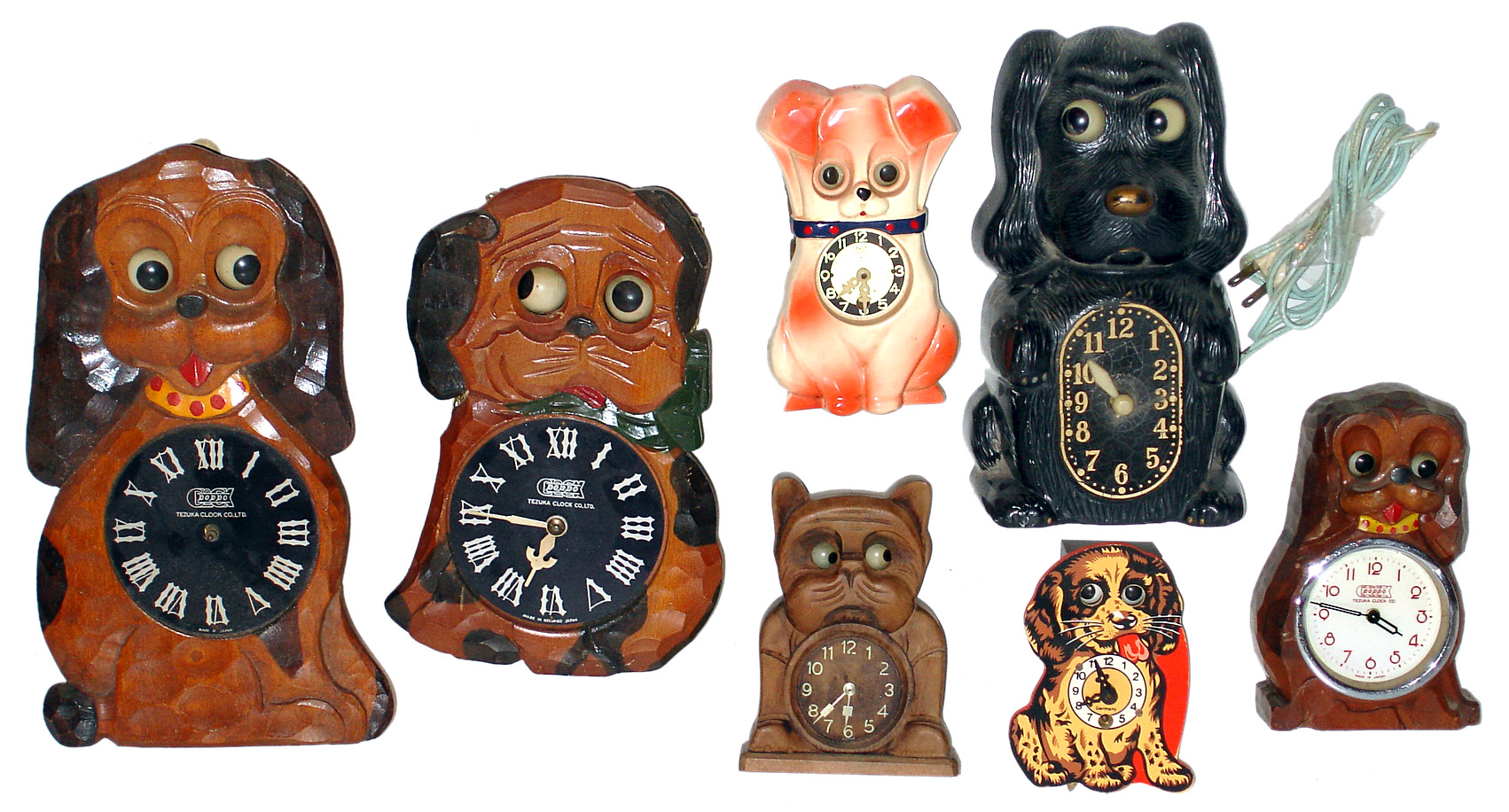 Seven dog moving-eye novelty clocks, later 20th century. — Antique Clocks Price Guide