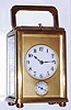 Charles Hour, French brass, one-piece cased, Grand Sonnerie carriage clock, time, choice of strike and alarm with qtr repeat in an early style case with a full glass top, a matt-gilt mask surrounding the dials, c1900