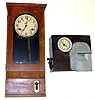 Two time recording 8 day clocks. First is Simplex, Gardner, Mass., U.S.A., 31" tall. Second is rarer, smaller (but also very heavy) English model, National Time Recorder Co., St. Mary Cray, Kent., 13" tall.