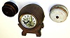 Three American 30 hour metal novelty clocks. Two are Lux "tape measure" horizontal dial. Largest and best is United Clock Co. beer keg with animated dial of bartender shaking cocktails, 9" tall.
