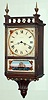 Waltham Clock Co., Waltham, Mass. miniature wall timepiece with 8 day spring driven movement in mahogany case, c1930