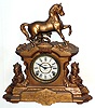 Kroeber Dexter bronze figural case now with E. Ingraham Co., Bristol, Conn.8 day time and strike movement and dial, c.1880.