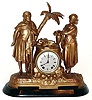 Seth Thomas and Sons No. 8003 double figure cast metal 15 day time and strike mantel clock, c1872.