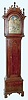 Nathaniel Shipman, Norwich, Conn., tall case clock 8 day time and strike brass movement in cherry case with bracket base, quarter reeded columns, wooden capitals, whale's tail frets, flame finials, tombstone door and scalloped skirt. The brass dial is signed "Shipman Norwich" with moon phases, second hand, and calendar above 6, c1790