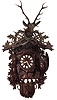 German Black Forest oversize cuckoo clock with 30 hour time, strike and musical three weight driven movement likely in linden wood case, c1880