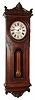 E. Howard and Co., Boston, Mass., "Regulator No. 41" wall clock 8 day time only weight driven movement in walnut case with reverse painted lower tablet and painted metal dial, c1874