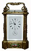 French, Brass cased carriage clock, with columns, engraving and case appliques, for the eastern market. Note the bell is for the alarm only, Hour strike is on a gong in the base and a fine chain extends from the articulated gong hammer up to the striking arm in its normal position, c1855