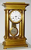 French, Signed Lepine, 4 column Empire style mantel regulator, ormolu case and with pinwheel, 30 day movement and with a compensating grid pendulum with unique temperature variation scale on the front of the pendulum bob, showing from zero change (at top) to a max of plus or minus 40 degrees (at the bottom). Wording is in French (Froid . de Chaud). The pendulum with knife edge suspension, and the dial showing center seconds, the escape wheel having 60 pins and rotating once per minute, c1825