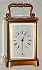 French, Brass cased carriage timepiece with embossed platform and duplex escapement, the balance with bat wings. There is a large seconds hand above 12 that completes its minute circle in 36 seconds, c1900