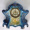 Ansonia Clock Co., Royal Bonn "La Layon" porcelain china clock in medium blue with yellow floral accents and open escapement dial, c1900
