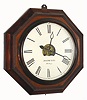 Atkins Clock Co., Bristol, Conn, 30-Day Wagon Spring wall timepiece, a large octagonal case with rosewood veneer and ripple molding accents, and with an old repair label from C R Smith and Son, corner Market and 18th St, Philadelphia, label showing repair on March 6, 1891, and perhaps the original sale in 1862. Circa1860