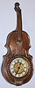 Ansonia Clock Co., 30-hour brass musical instrument novelty timepiece. c. 1904. This appears to be a part from a timepiece named the "Violone" this was made up mounted on a stand.