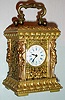 French, 8 day Caryatids style gilt case with pierced and chased decoration miniature carriage timepiece, c1889