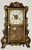 E. and A. Ingraham, Bristol, Ct., scroll front stenciled 30 hour time and strike shelf clock, c1855.