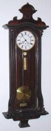 German, 1-weight "Vienna Regulator" in a grained case with original top, slide mount movement with original brass brackets, old pulley and hands, c1880 — Antique Clocks Price Guide