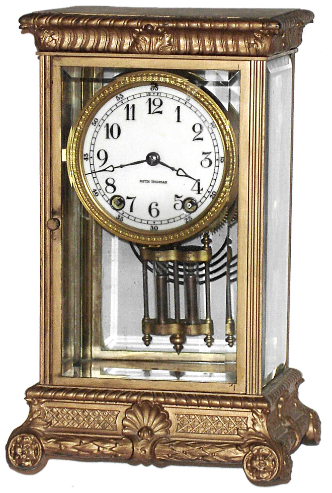 Seth Thomas Clock Co., Thomaston, Conn., "Empire No. 13" 8 day time and strike brass and glass crystal regulator mantel clock, c1907 — Antique Clocks Price Guide