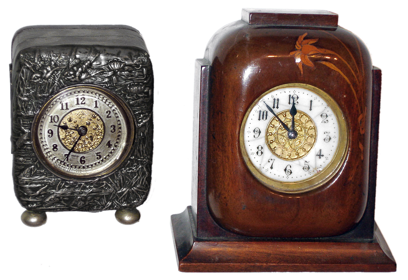 Clocks- 2 (Two) small rear wind 30 hour metal drum clocks in ornate stands, Ansonia and British United, late 19th century — Antique Clocks Price Guide