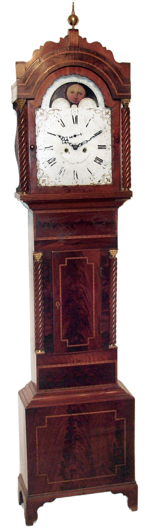 Robert Gibson, Whitehaven, England tall case clock, 8 day, time and strike, weight driven movement in an inlaid mahogany case with rope turned columns flanking trunk and hood. The painted iron dial has moon phase and second's bit, c1820 — Antique Clocks Price Guide