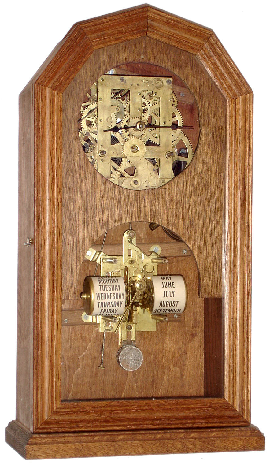 Waterbury Clock Co., Waterbury, Conn., upper and lower mechanisms for a calendar clock, 8 day, time and strike, spring driven movement with perpetual calendar, c1880 — Antique Clocks Price Guide
