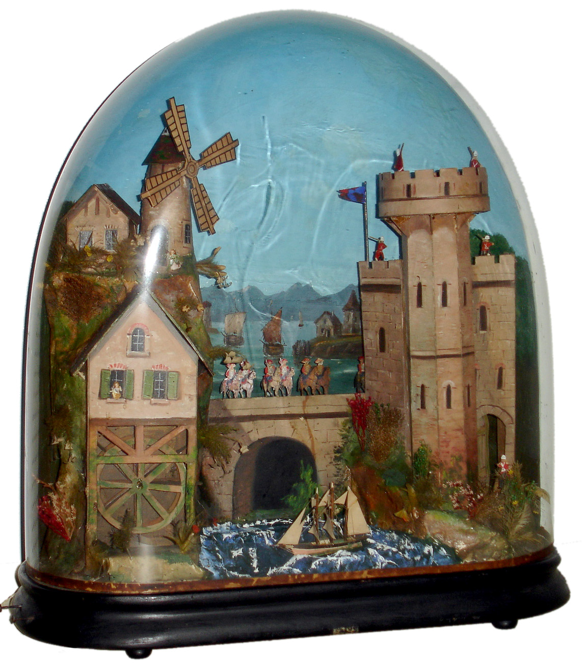 Automaton with music box, depicting castle scene with moving windmill, water wheel, soldiers on turret and horse back and rocking ship. The scene is enclosed in a background painted large oval dome, c1875 — Antique Clocks Price Guide