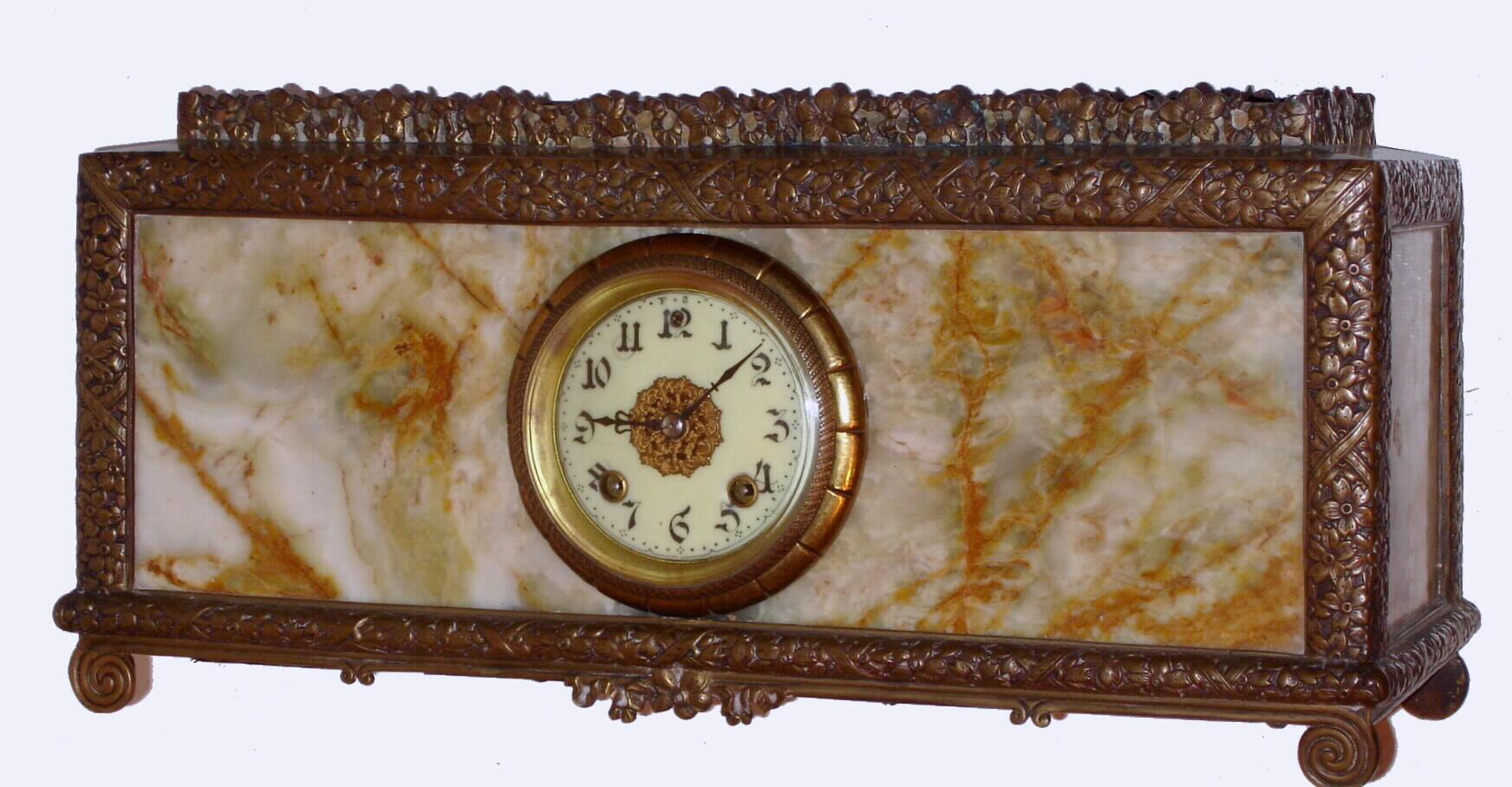New Haven Clock Co., a marble and bronze clock, limited production, using the heavy cast moldings used earlier on the "Tile" model, 8 day, time and strike, c1890 — Antique Clocks Price Guide