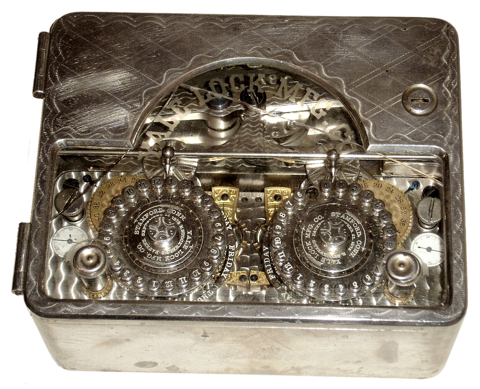 Yale Lock Mfg. Co., Stamford, Conn., double pin dial time lock or vault timer, "Model 1" with the rare Sunday dial attachment and two high grade E. Howard and Co., Boston, 2 - 3 day, spring driven movements with lever escapements in a very finely finished Yale Lock Mfg. nickel plated case, movement s#1005 c1880 — Antique Clocks Price Guide