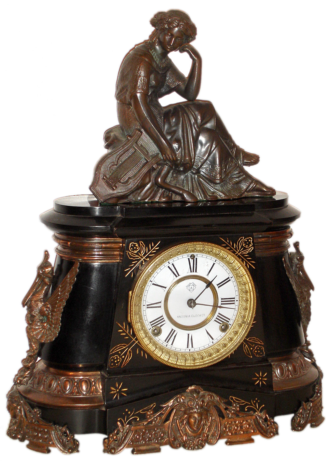 Ansonia Clock Co., New York, "Pompeii", 8 day, time and strike, enameled iron mantel clock with accompanying statue "Music", c1904 — Antique Clocks Price Guide