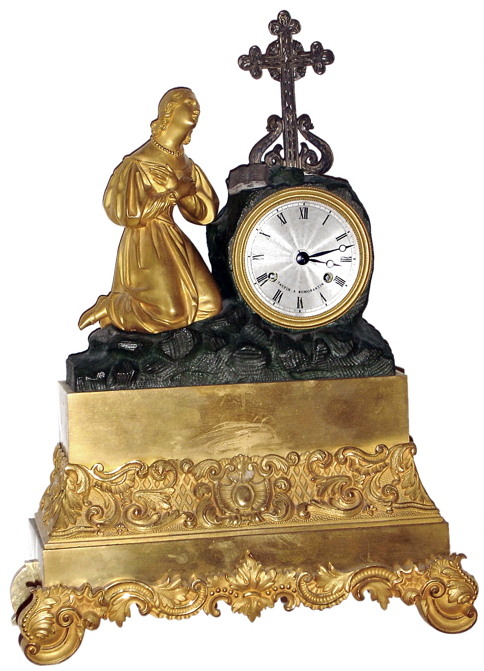French gilded, 8 day, time and strike, silk suspension figural mantel clock with a figure praying next to a cross. Name found on the dial reads: "Taupin A Romorantin", c1840 — Antique Clocks Price Guide