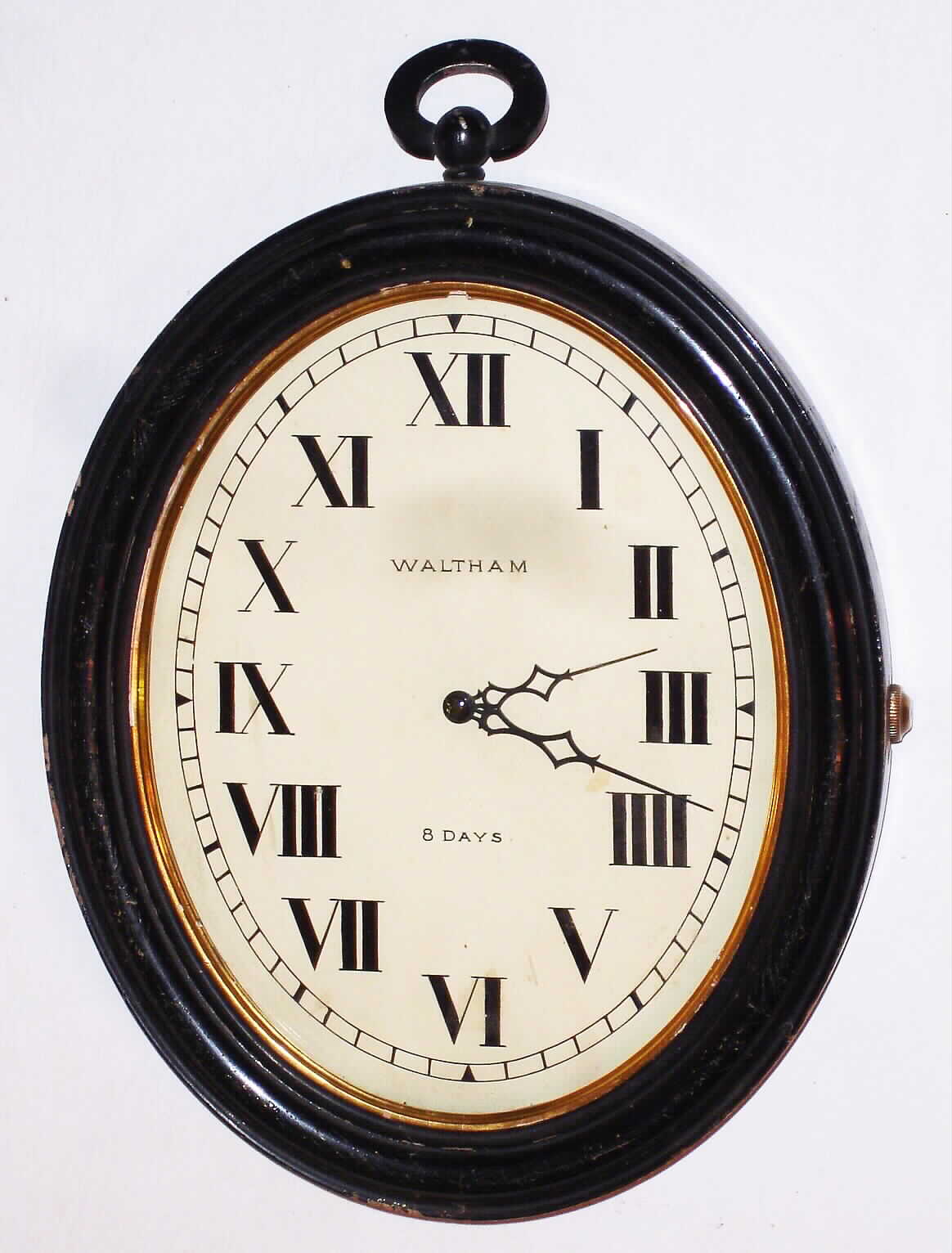Waltham Watch Co. No. 1427 8 day black painted oval hanging library timepiece, c1925 — Antique Clocks Price Guide