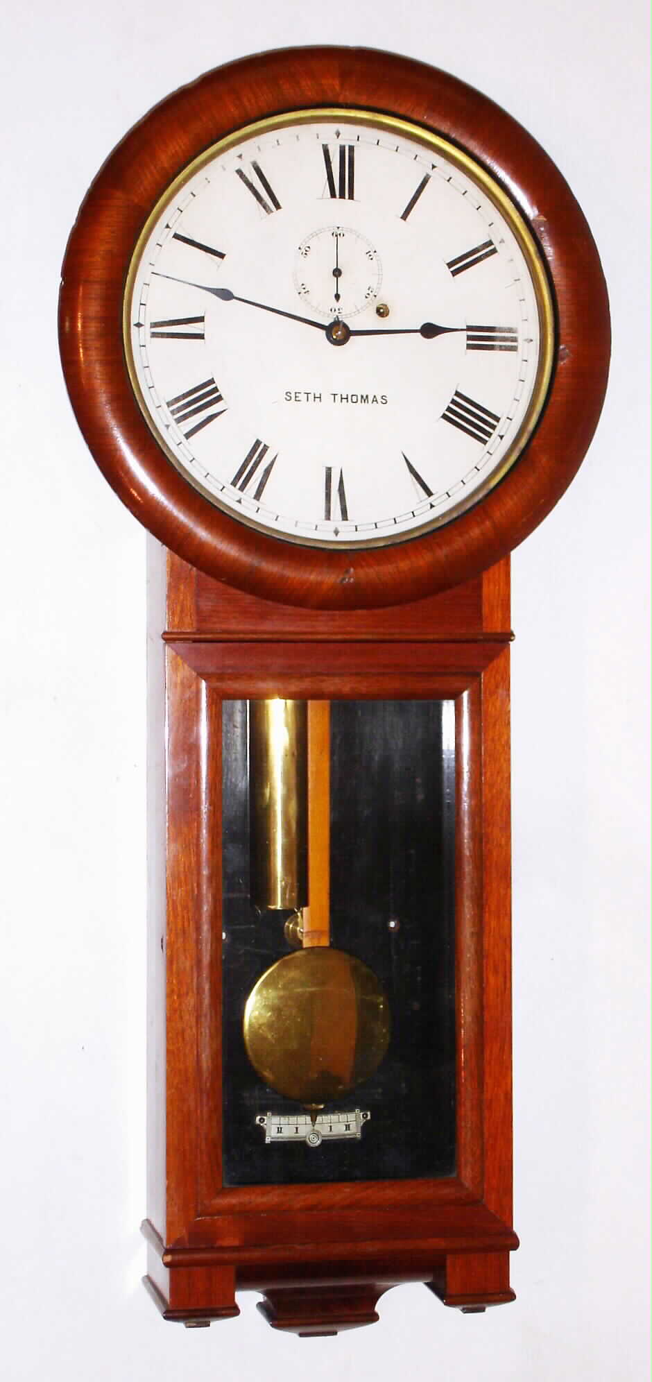 Seth Thomas Clock Co., Thomaston, Conn., "Regulator No. 2" 8 day weight driven walnut timepiece, 1886 — Antique Clocks Price Guide