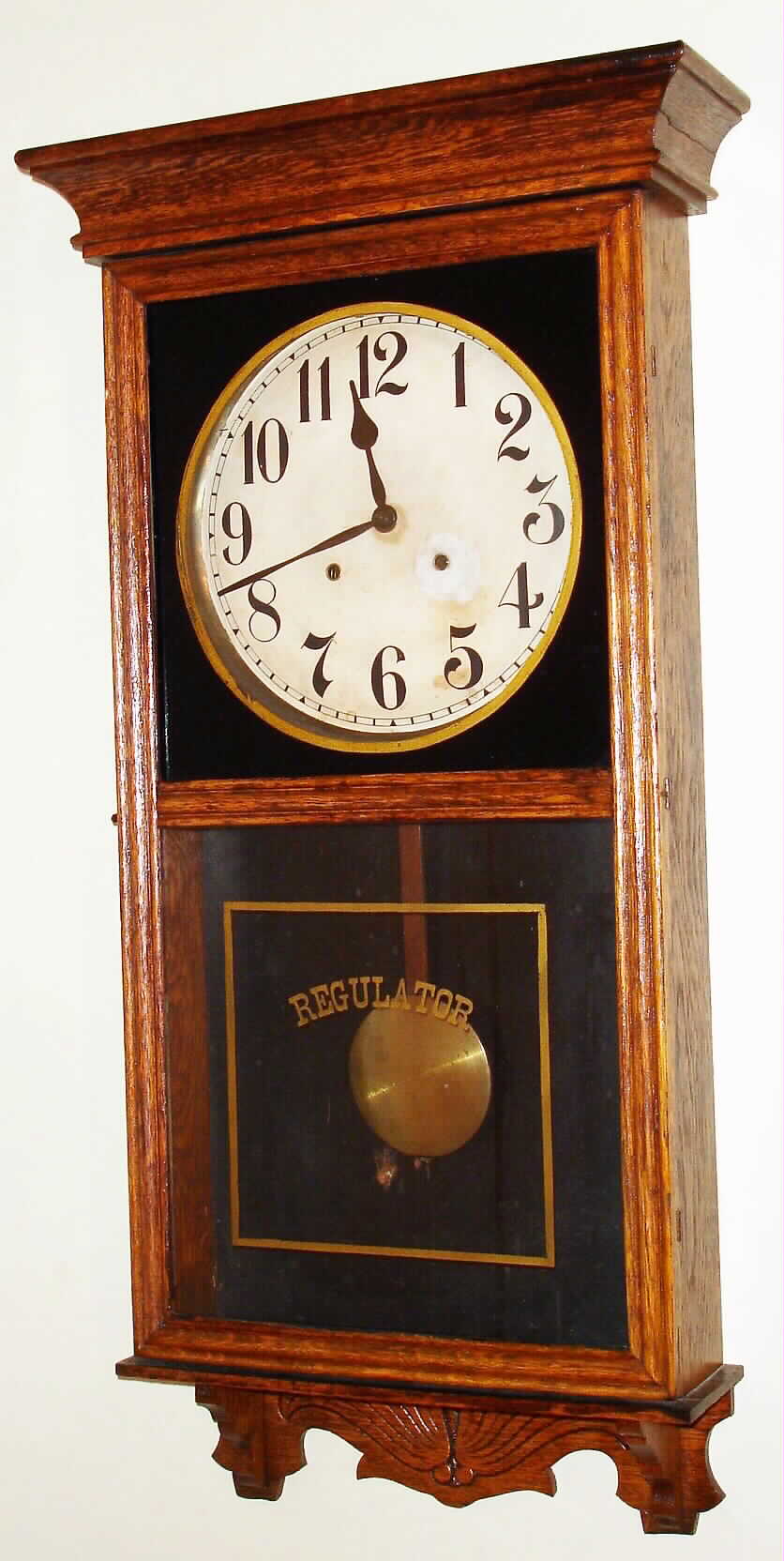 Gilbert Clock Co., Winsted, Conn., "Washington" box regulator wall clock, 8 day, time and strike, spring driven movement in oak case with painted metal dial, c1913 — Antique Clocks Price Guide