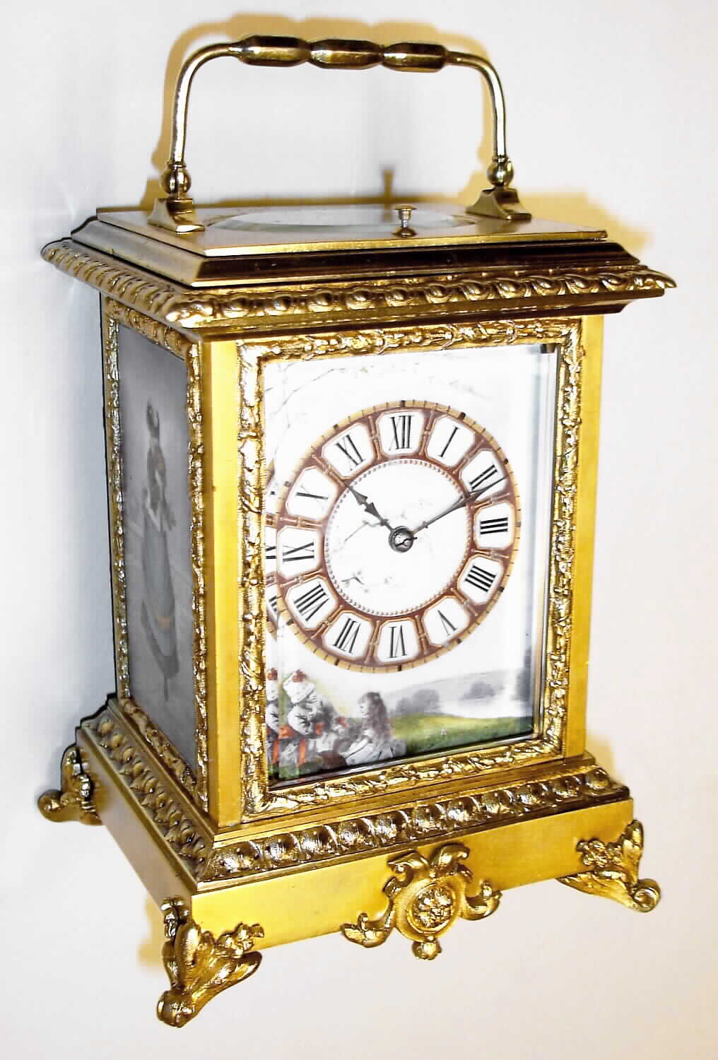France, carriage clock, Anglaise case with Rococo decorations and multicolor finely painted porcelain panels of Victorian ladies, 8 day, time, half hour strike and hour repeat, spring driven movement in gilded brass case, c1880 — Antique Clocks Price Guide