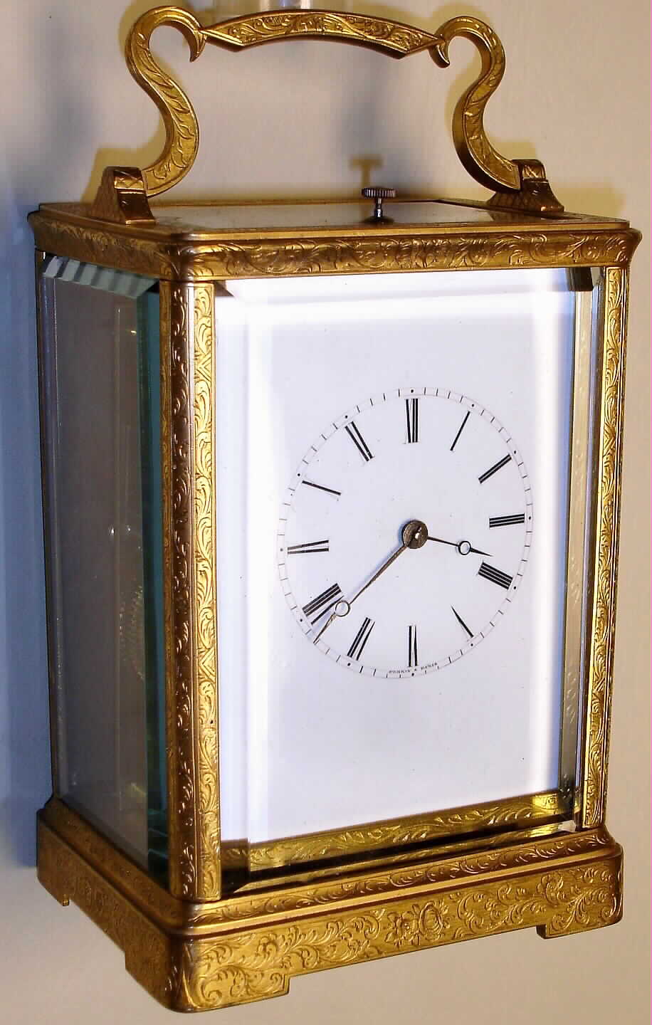 Perrin Paris, France carriage clock in engraved corniche brass case with 8 day, time, half hour strike and hour repeat, spring driven movement with fine platform escapement and helicoil hairspring and Roman numeral white enamel dial, c1840 — Antique Clocks Price Guide
