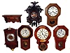 Clocks- 6 (Six) wall clocks: modern Asian wood reproductions including three schoolhouse, a mosaic ionic, and a two weight cuckoo. All except one are strikers. A wall mount shelf for gingerbreads completes the lot
