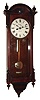 Seth Thomas Clock Co., Thomaston, Conn., "Regulator No. 6" wall clock, 8 day time only weight driven movement in walnut case, dated 1886.