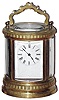 French miniature time only 8 day oval brass and glass carriage clock with travel case, c1900.