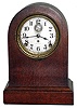 Seth Thomas Clock Co., Thomaston, Conn., "Automatic Eight Day Long Alarm" oak round top mantel clock, c1920