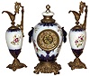 F. Kroeber, New York, "China Set No. 31" porcelain group with 8 day time and strike clock and two "Vase No. 3", c1898