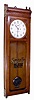 E. Howard and Co., Boston, "REGULATOR No. 72", for the Santa Fe Railway, La Junta, Colorado station, in walnut, 8 day weight, and with original Santa Fe maintenance sticker behind the dial plate, c1890.