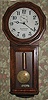 Chelsea for Ball Watch Co., Cleveland, large weight regulator, model 2Q, in an oak case of mostly solid oak, similar in style to the Seth Thomas #3, serial #163538, c1924, with Graham's dead beat escapement and maintaining power, from the Wasserman collection.