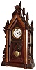 Unknown, 8 day time and strike steeple clock variant. We have never seen this model before. It could have been made by an individual craftsman as it is fitted with a Terry and Andrews movement that dates from an earlier period. It does not appear to be a factory made clock as the backboard is made from walnut which is a wood not normally used for that purpose. If it was a manufactured piece, a movement closer to the age of the case and fancy pendulum would have been chosen, c1880