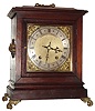 Winterhalder and Hofmeier, Germany for J.E. Caldwell, Philadelphia bracket clock, 8 day, time and quarter hour bim bam strike in a mahogany case with brass handles, feet and lion ornaments, c1900