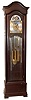 Waltham Clock Co., Waltham, Mass., 9 tube hall clock, 8 day, time, strike and chime, weight driven movement playing Whittington, Westminster, or St. Michael's tune in mahogany case with six heavily beveled glasses. The silvered arched dial has applied brass numerals, finely cast spandrels and dial center, moonphase, selection for tunes or silent, and second's bit, c1918
