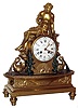 Lepine, Paris, France figural clock, 8 day, time and bell strike, spring driven movement in gilt ormolu case with seated figure surmounting 10" white enamel dial, a peacock and two swans with turned feet, c1880